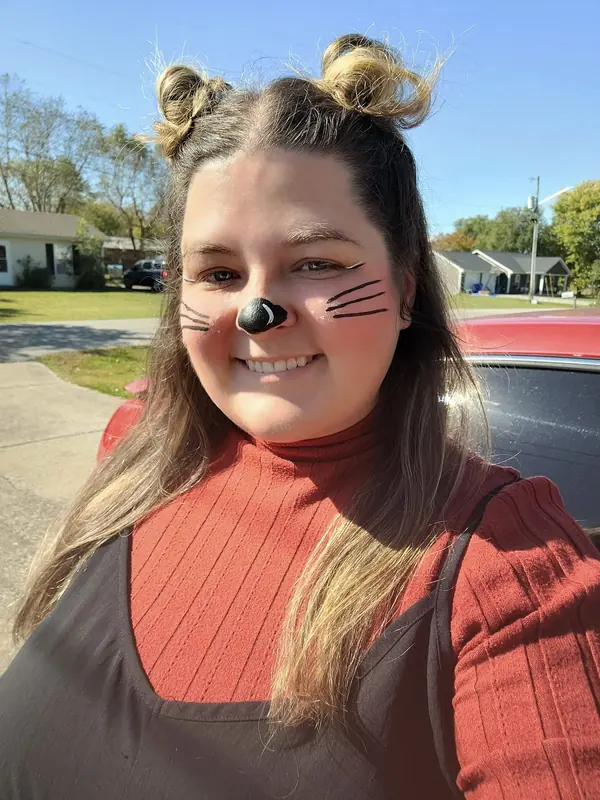 Jordan wearing a mouse nose and whiskers design