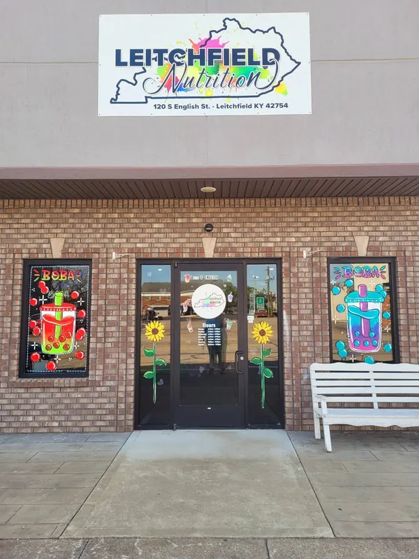 Leitchfield Tourism storefront with painted windows